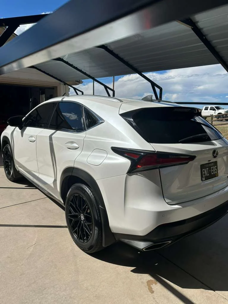 Clean white SUV exterior after detailing