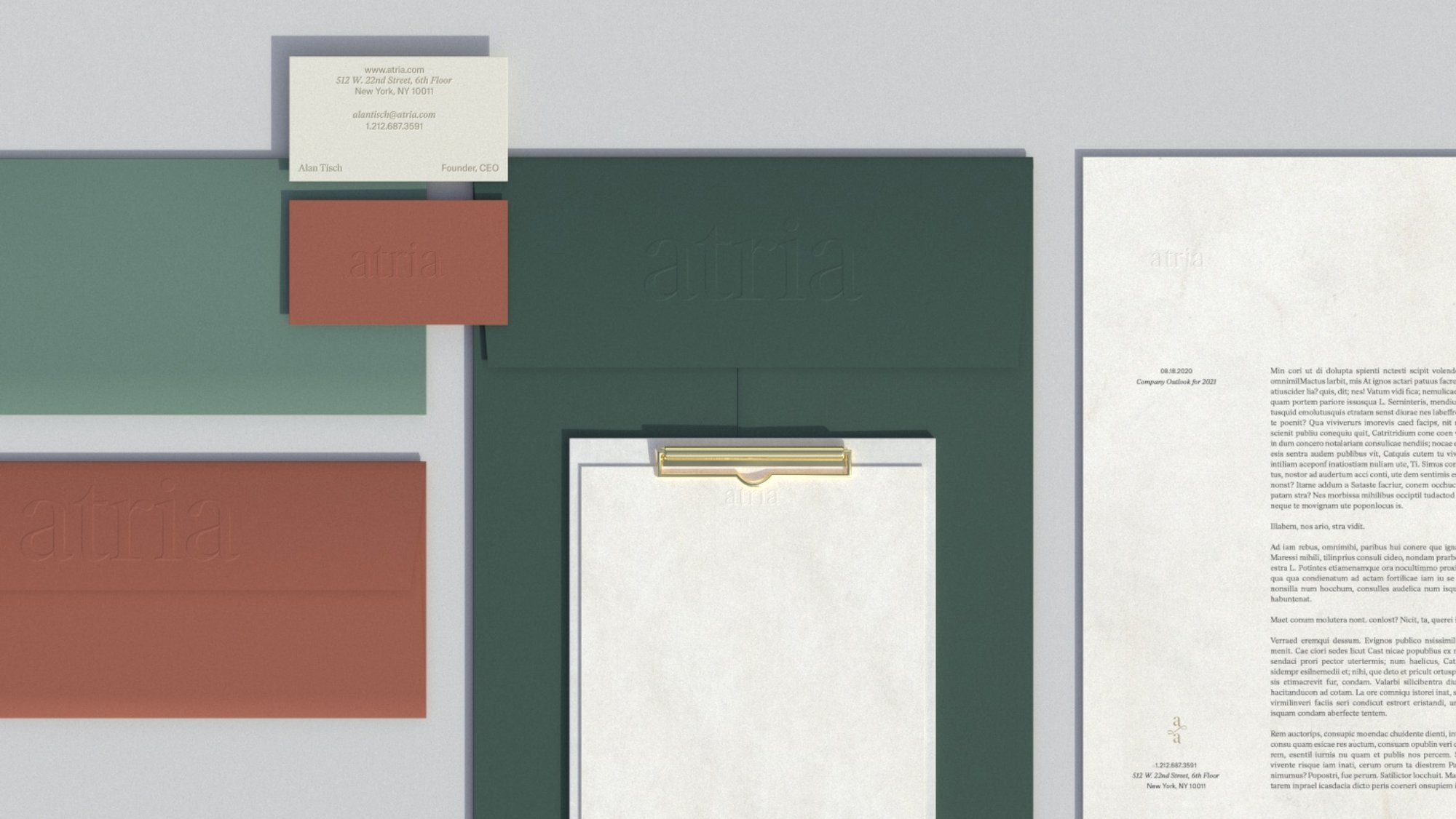 Branded Atria stationary, business cards, envelopes, and notebooks with an embossed Atria logo in white, green, and red