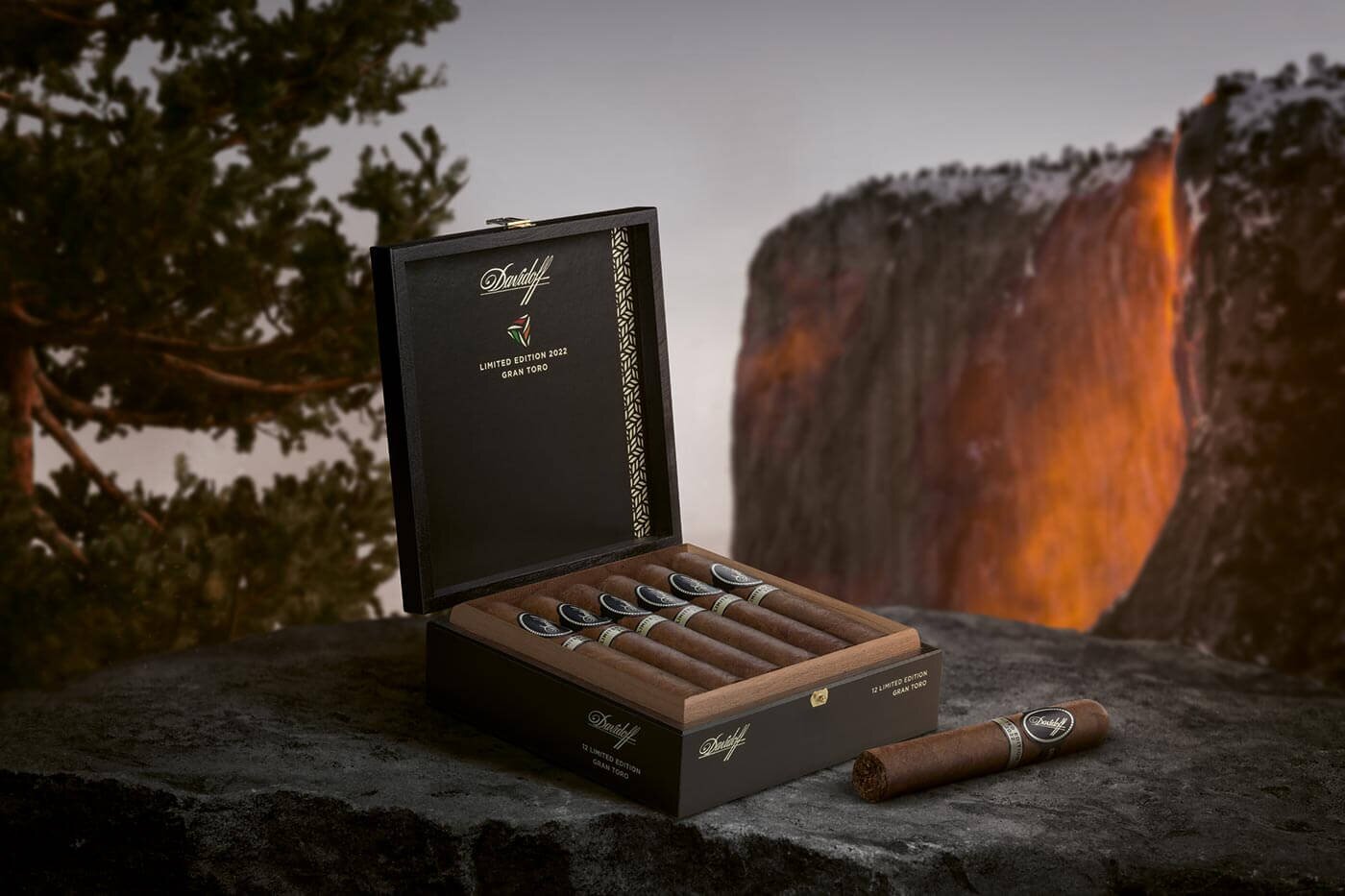 Davidoff Limited Edition 2022 open cigar box on top of a rock with lava dripping from the volcano in the background.