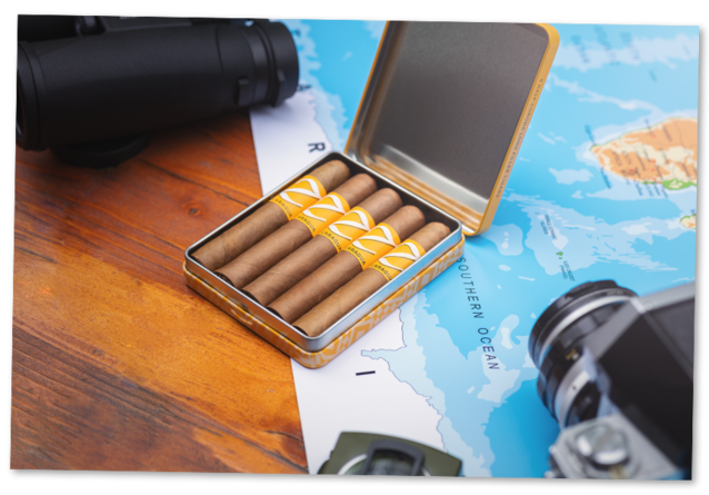 Zino Nicaragua Half Corona open Tin on top of a world map.