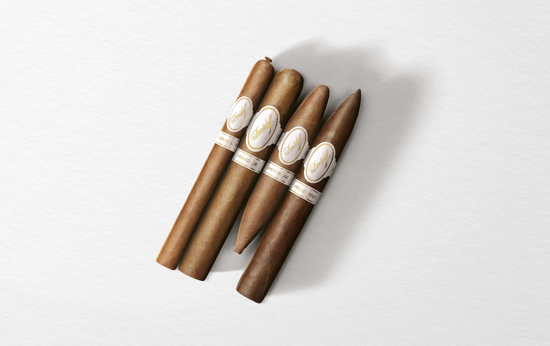 The Differnece 2025, bunch of four Davidoff cigars on white background