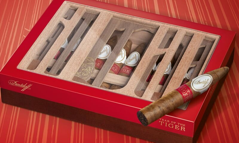 A close-up of the Davidoff Year of the Tiger Limited Edition cigar box with a pyramid cigar on top. 