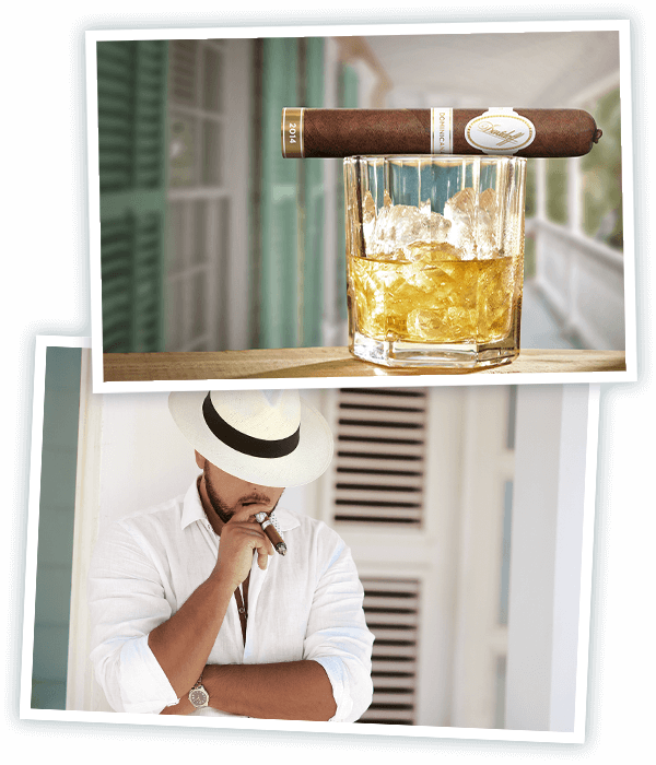 A Davidoff Dominicana Robusto Cigar lying on top of a glas of rum on a front porch and Man dressed in white with a Dominican heat smoking a Davidoff Dominicana Cigar