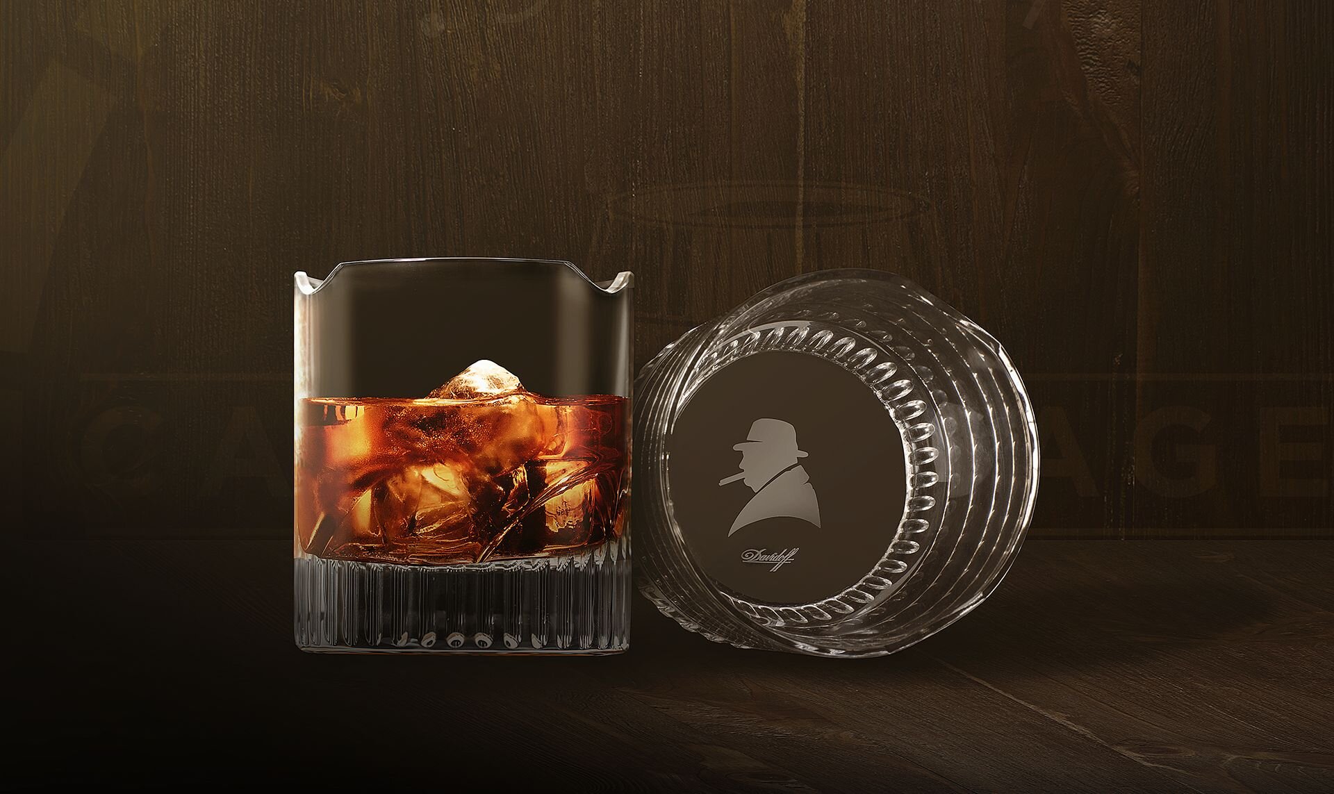 Two Winston Churchill cigar glasses on a black background, one is filled with whisky, the other glass is tilted and lying on the surface.  