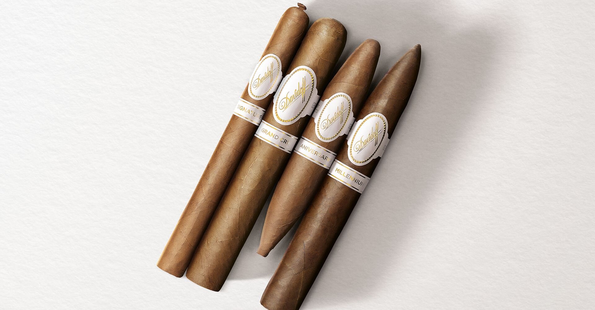 4 cigars of the Davidoff White Band Collection lines Signature, Grand Cru, Millennium and Aniversario.