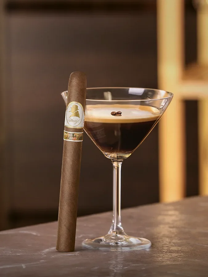 The Davidoff Winston Churchill Limited Edition 2025 leaning against an Espresso Martini.