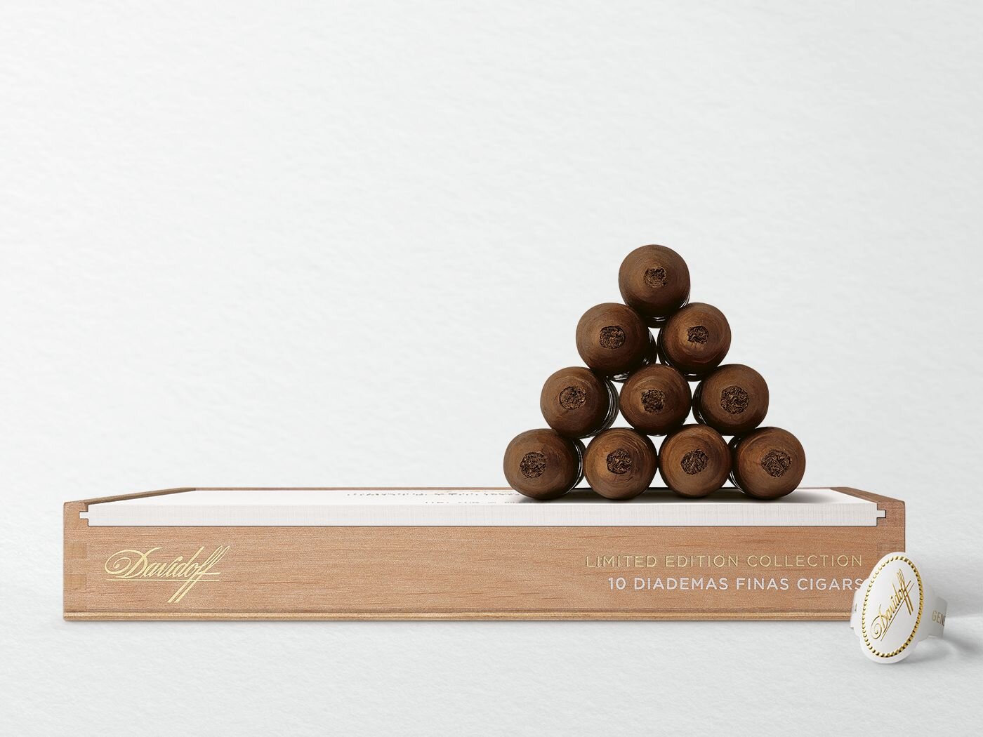 Ten cigars of the Davidoff Grand Cru Diademas Finas Limited Edition Collection on top of their box.