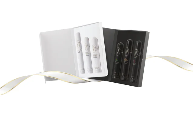 Opened Davidoff Gift Selection Tubos White Band and Black Band with cigars inside and a white and gold ribbon in the background. 