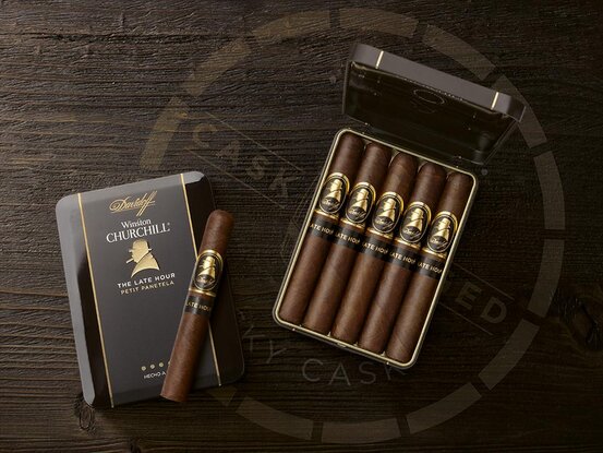 Two tins of the «The Late Hour Series» Petit Panetela cigars.