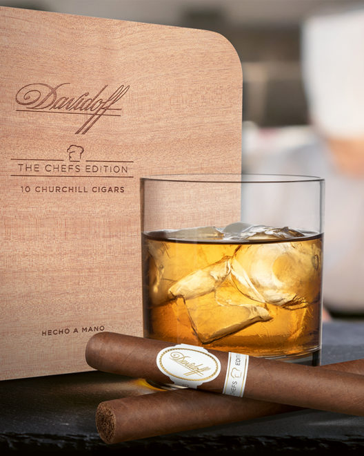 Davidoff Chefs Edition 2021 Churchill Cigar leaning on a glass of aged whisky