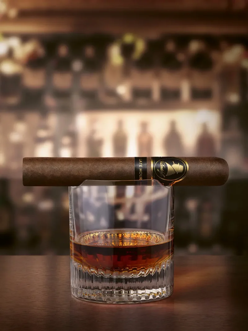 A Davidoff Winston Churchill «The Original Series» cigar on a spirit glass.