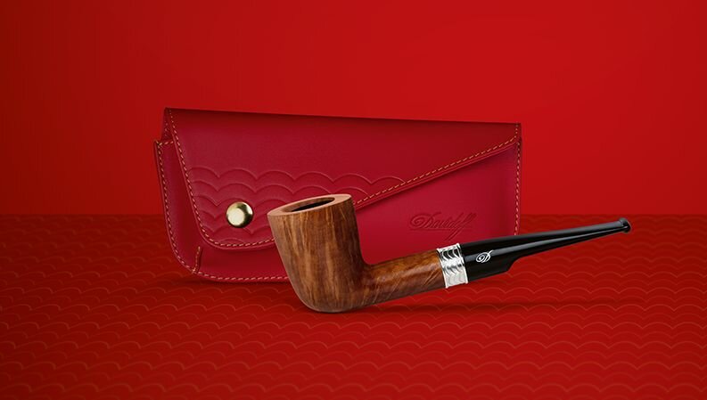 Davidoff Year of the Rabbit pipe next to its leather pouch. 