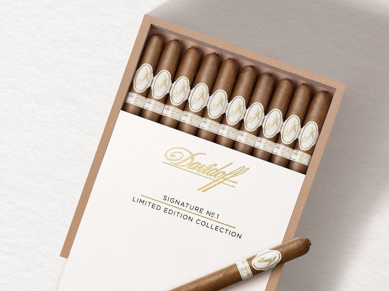 Opened box of the Davidoff Signature No. 1 Limited Edition Collection with one cigar placed on top.