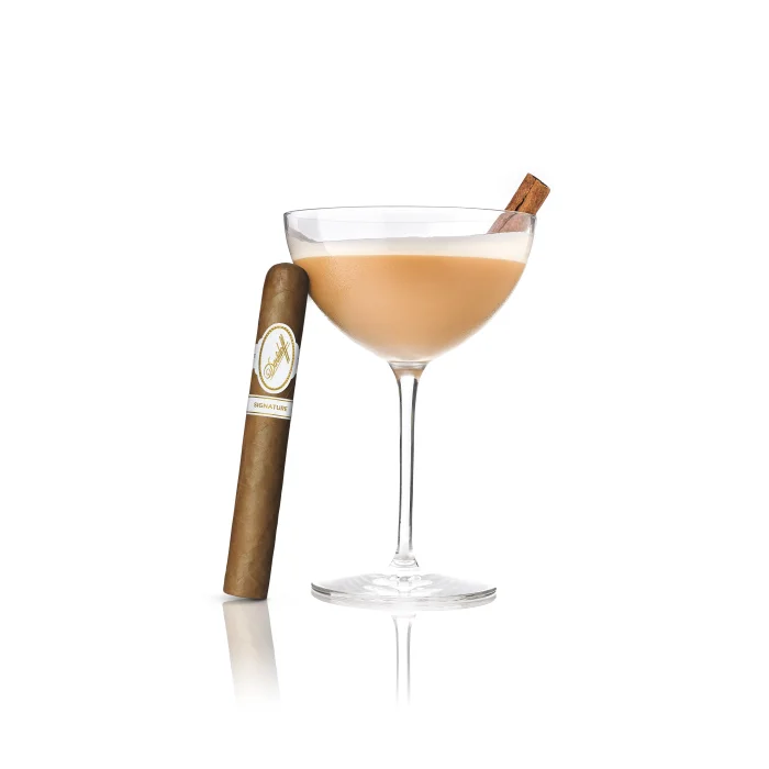 Morning Coffee cocktail with cinnamon stick, served with a Davidoff Signature cigar.