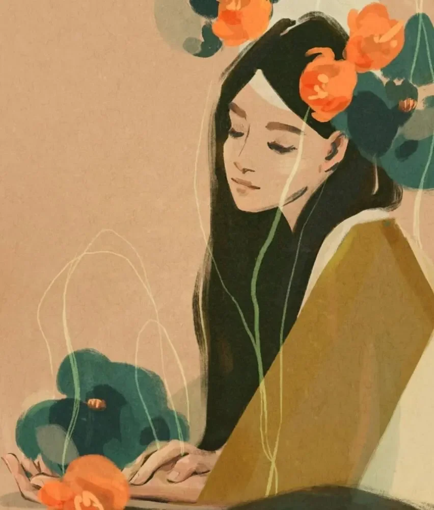 A woman with long hair adorned with vibrant orange flowers on her head, smiling softly at the camera.