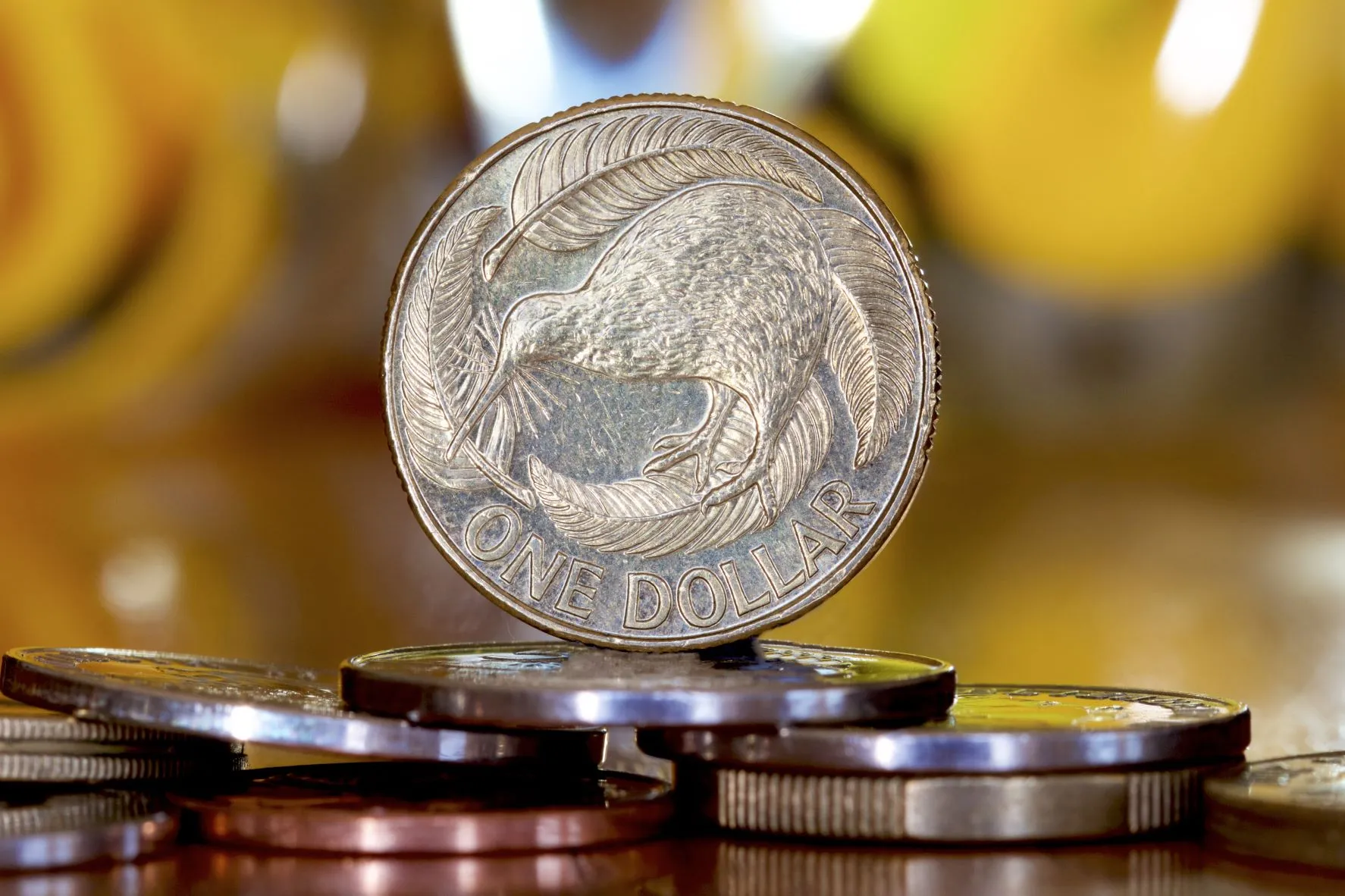Kiwi firms after RBNZ signals end to easing