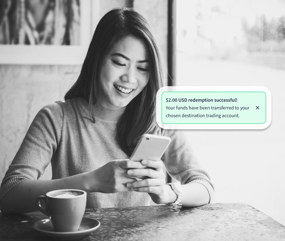 Person using Alpari App to redeem reward points