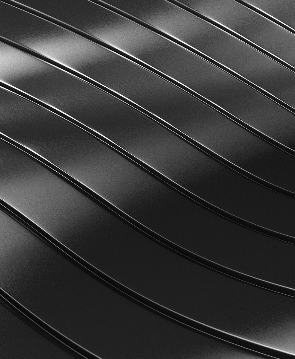 black and white image of wavy metallic surface