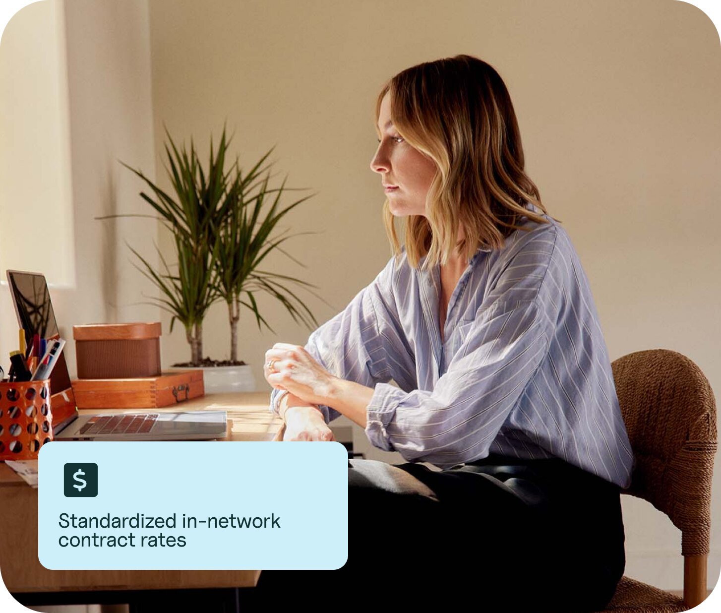 woman using a computer with text overlay saying "Standardized in-network contract rates"