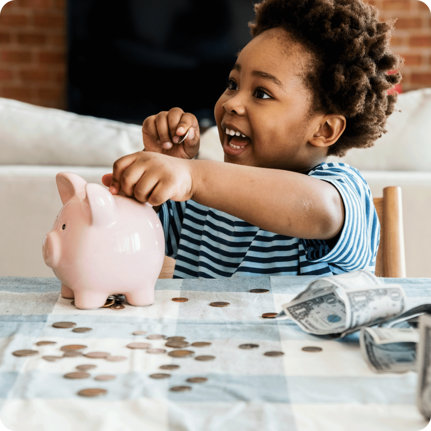 child using a token economy chart piggy bank