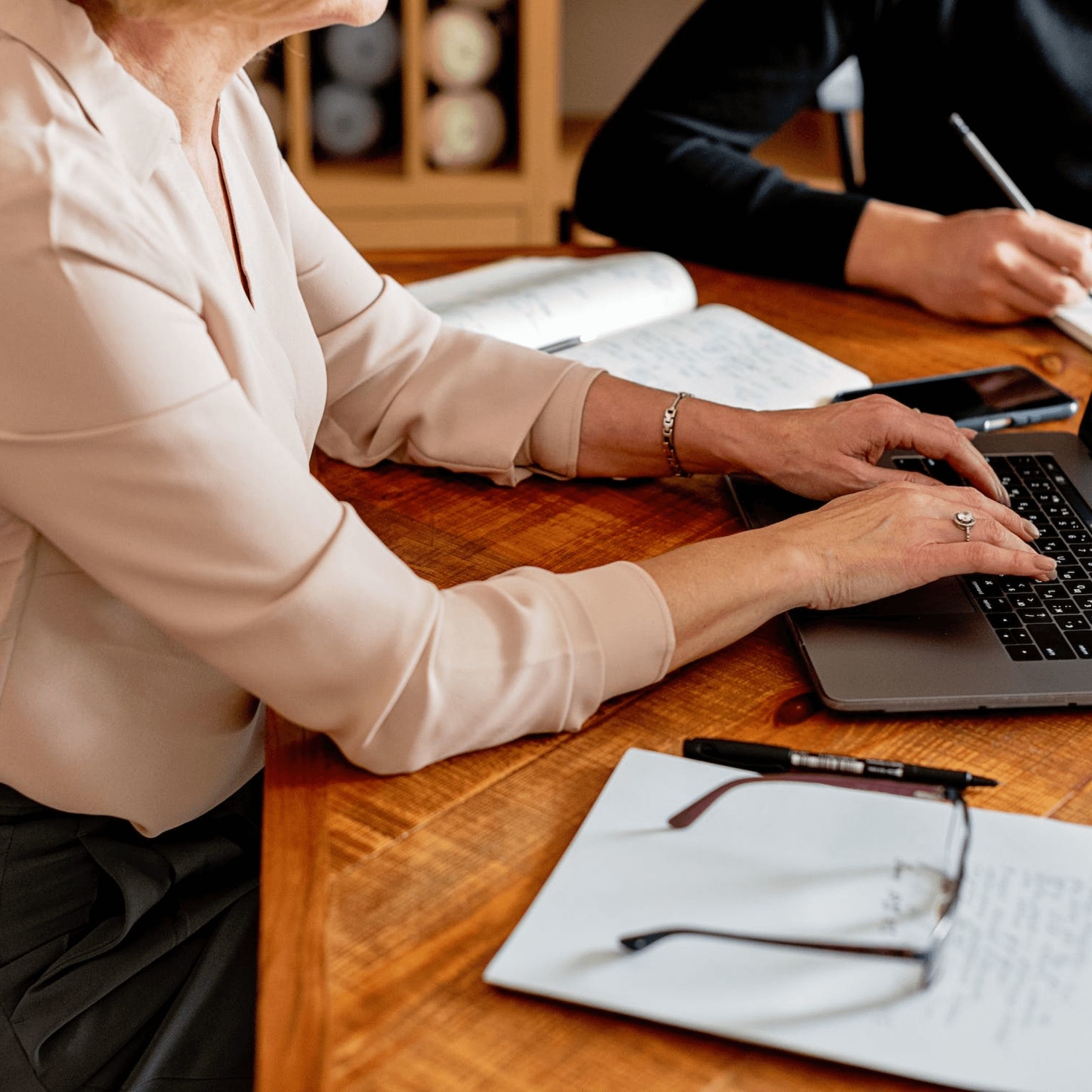 Female clinician looking for the ADHD ICD-10 code on her laptop