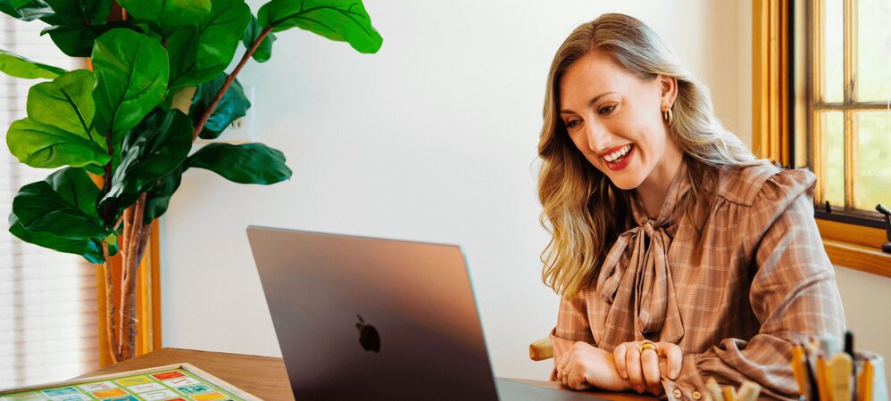 female clinician using their laptop