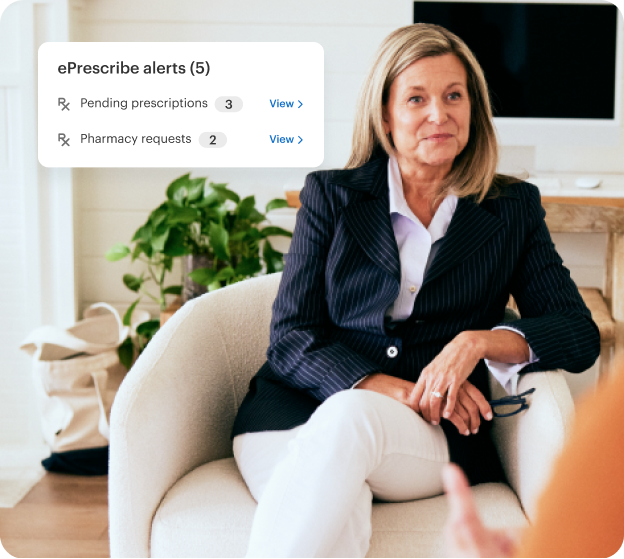 psychiatrist sitting on a chair with a patient. overlay titled "eprescribe alerts" is shown with pending prescriptions and requests