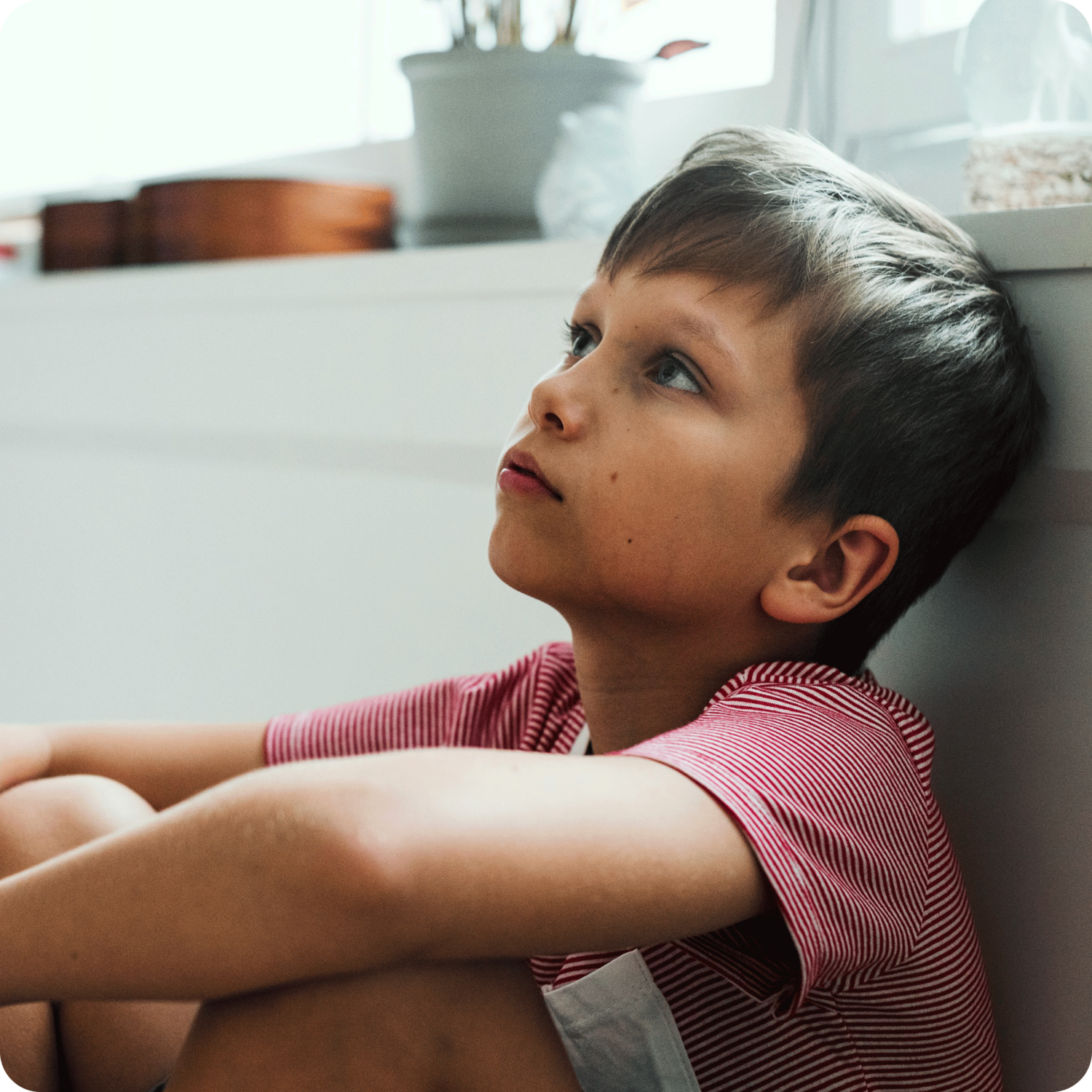 boy sitting and waiting in a time-out