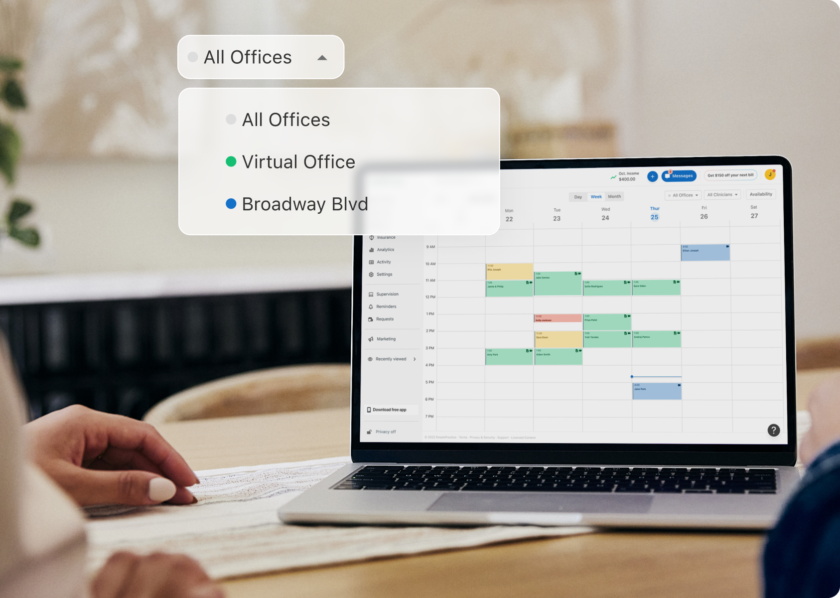 laptop with simplepractice ehr on the screen showing a dropdown of multiple office locations