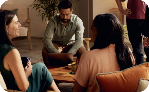 group of people sitting together and talking
