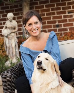 Dominique with golden retriever