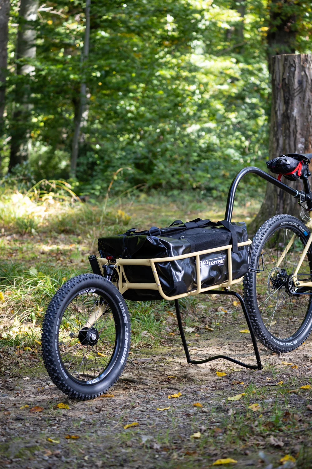 Tout Terrain Mule trailer in matching orange with dynamo lighting