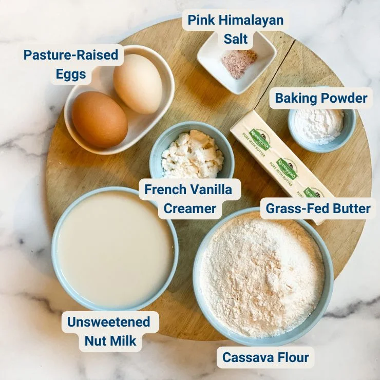 Top view of pancake ingredients with their names labeled next to them.
