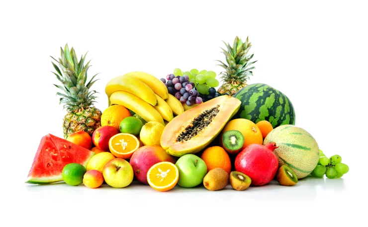 Assortment of tropical fruits on white background.