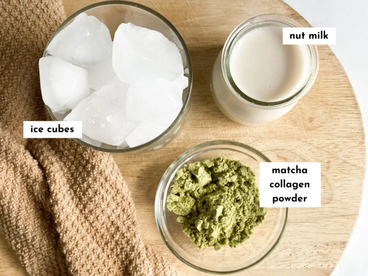 Top view of ingredients in an iced matcha collagen latte: one cup of ice cubes, one cup of nut milk, and one scoop of NativePath matcha collagen powder.