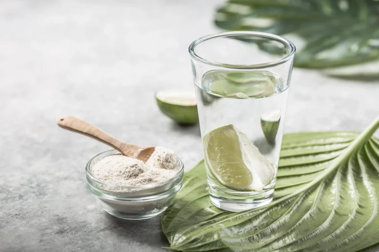 Collagen Powder and glass of water with a slice of Lime; Vitamin C. Collagen supplements may improve immunity