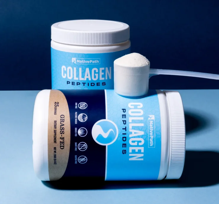 NativePath Collagen Jar with scoop of collagen on blue background