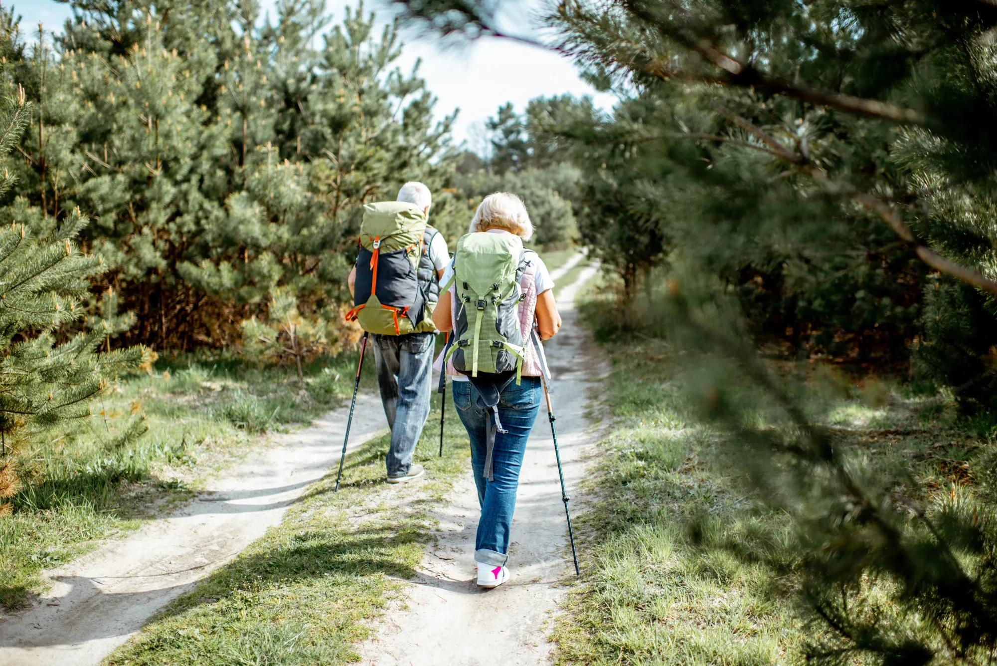 Older Couple Hiking along a Path