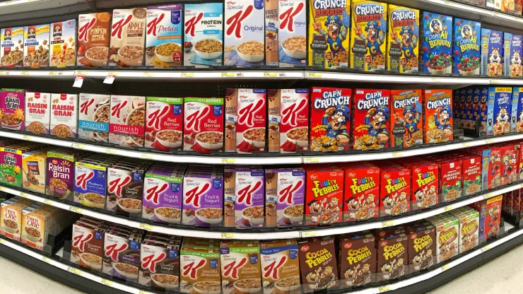 Grocery Store Shelves Lined with Packaged, Processed Foods