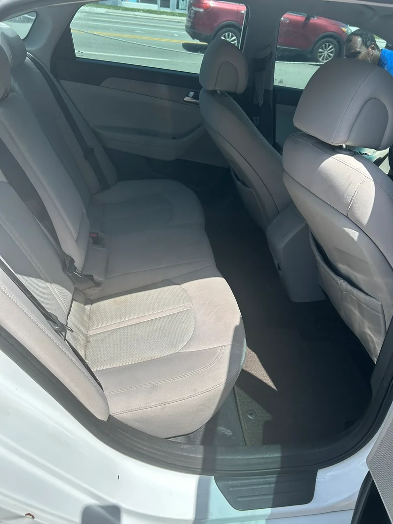 Clean fabric rear seats after interior cleaning