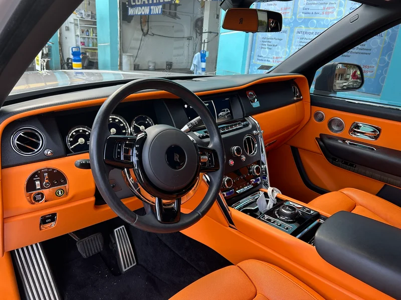 Orange leather interior of a luxury SUV