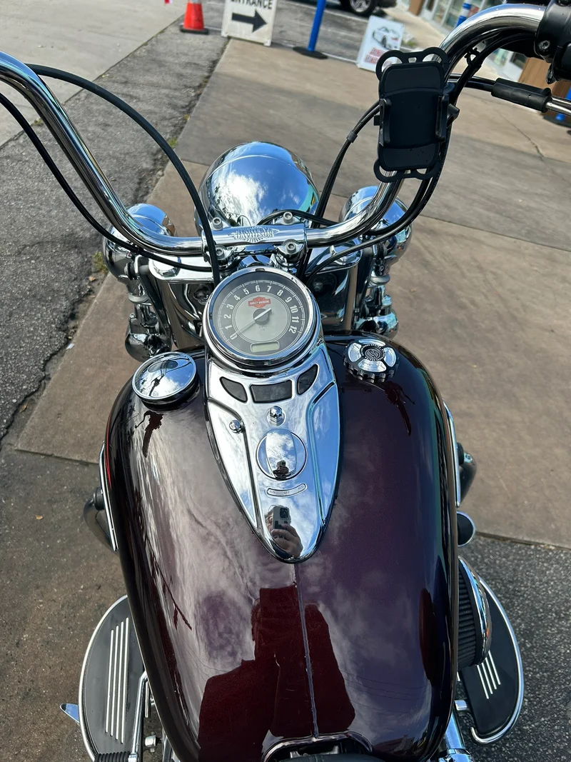 Chrome details on a maroon motorcycle