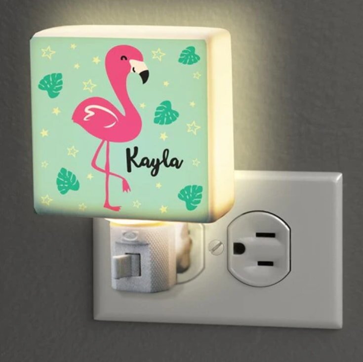 Monogrammed cutting board with cheese, grapes, and fruit