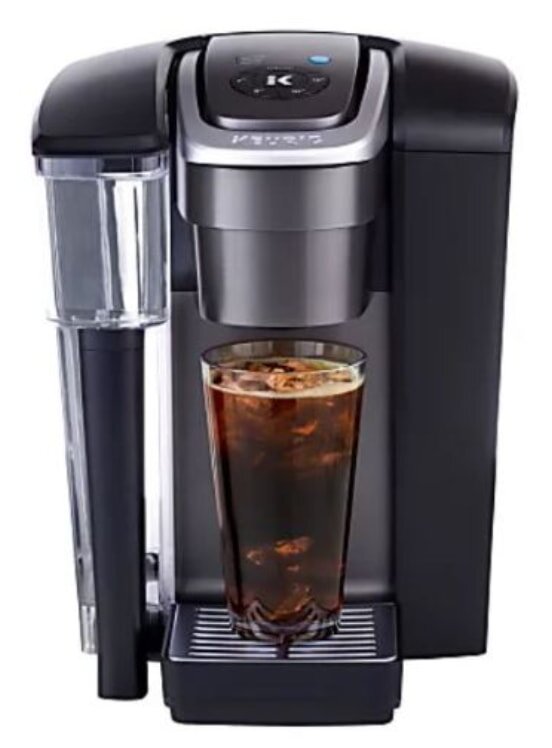 Woman receiving facial massage at spa