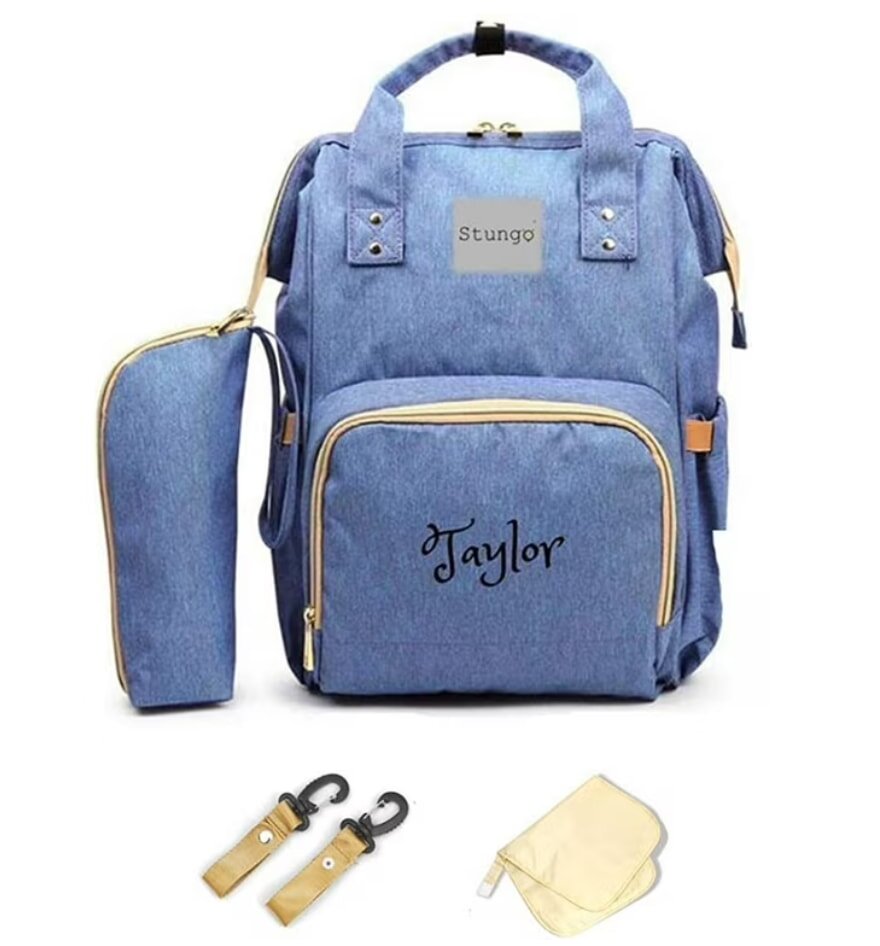 Blue backpack with matching insulated bottle holder and accessories. Front pocket reads "Taylor." Design is sleek and practical, conveying functionality.