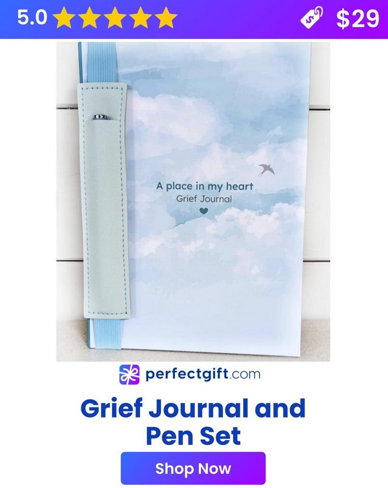 Grief journal with a soft cover and a matching pen set, designed for personal reflection and healing.