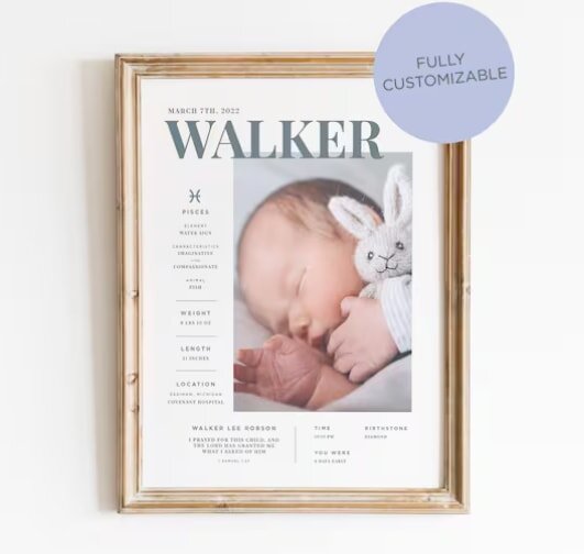 Framed birth announcement featuring a sleeping baby cuddling a stuffed bunny. Text details birth facts. A "Fully Customizable" sticker is on the top right.