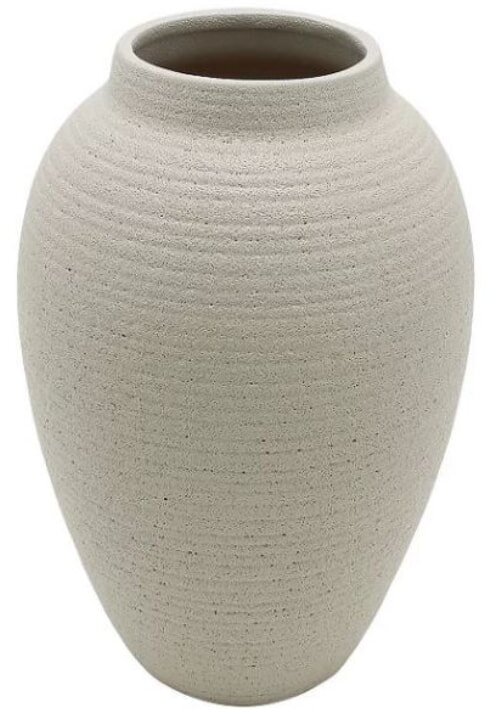 A beige, textured ceramic vase with a wide, rounded body and narrow opening. The surface features horizontal grooves, conveying simplicity and elegance.