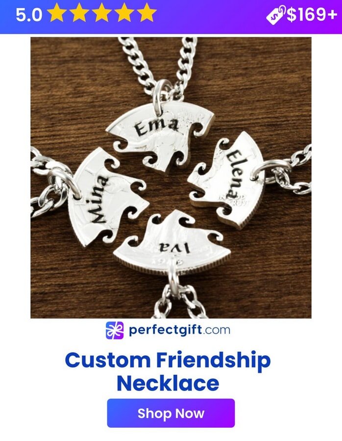 Custom friendship necklace with four silver puzzle pieces, each engraved with a name, on a wooden background.