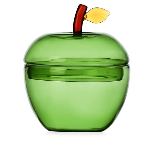 A green apple-shaped container with a matching lid, designed for storage or decorative purposes.